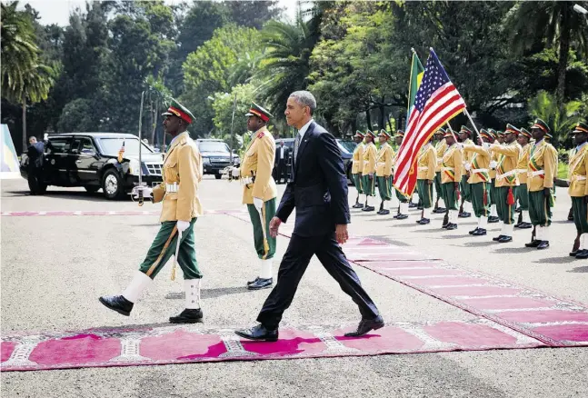  ?? Doug Mils / The New York
Times ?? U.S. President Barack Obama is welcomed by an honour guard as he arrives Monday at the National Palace in Addis Ababa, capital of Ethiopia.