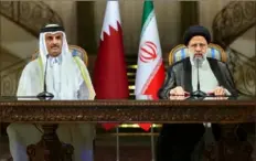  ?? Iranian Presidency Office via AP ?? President Ebrahim Raisi, right, and Qatari Emir Hamad bin Jassim Al-Thani sit during their joint news briefing Thursday at Saadabad Palace in Tehran, Iran.