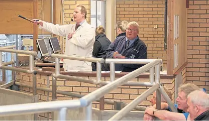  ?? Picture: Paul Smith. ?? Auctioneer Daniel Johnston conducting business at Forfar Mart.