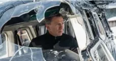  ?? JONATHAN OLLEY/THE ASSOCIATED PRESS ?? As iconic secret agent James Bond, Daniel Craig battled the evil forces of S.P.E.C.T.R.E. in the 2015 film of the same name.