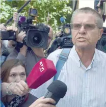  ?? — AFP ?? Alexei Ulyukayev addresses the media while leaving the Zamoskvore­tsky district court in Moscow on Tuesday.