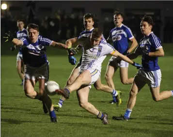  ??  ?? Wicklow’s Darragh Fitzgerald launches a shot towards the Laois goal. Photos: Barbara Flynn