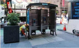  ?? Photograph: Steve Sanchez/Pacific Press/REX/Shuttersto­ck ?? Public pay phones in Manhattan, on the corner of 7th Avenue and 50th Street, being removed on 23 May 2022.