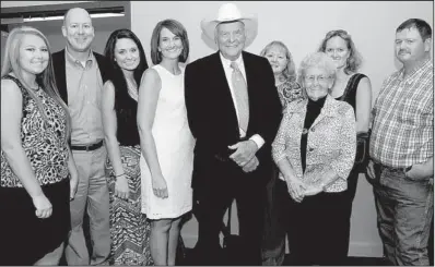  ??  ?? Legacy Award recipient Forrest L. Wood (center) and his wife, Nina, with family members (from left) Maddi
Daffron, Keith Daffron, Kiley Norris, Lisa Daffron, Linda Ward and Rhonda and Kirk Layton