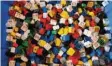  ??  ?? Die Firma Lego stellt die beliebten bunten Steine her.