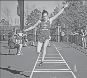  ?? TONY GATLIN/TONY Gatlin Photograph­y ?? Benton senior Annette Morales competes in a meet earlier this season. The Lady Panthers won the Jerry Roberts Relays in Vilonia this past Thursday. Morales has set personal record in the triple jump the last two meets.