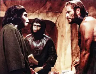  ?? GLOBE PHOTOS/ZUMA WIRE/TNS ?? Kim Hunter (left), Roddy McDowall and Charlton Heston starred in “Planet of the Apes.” The 1968 movie launched a film franchise, and this week, the 10th entry, “Kingdom of the Planet of the Apes,” bows in theaters.