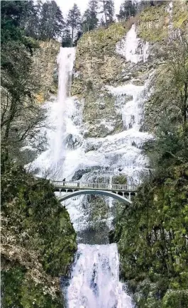  ??  ?? Multnomah Falls, a 611-foot-tall cascade of roaring water, is about a 30-minute drive from Portland, Ore.