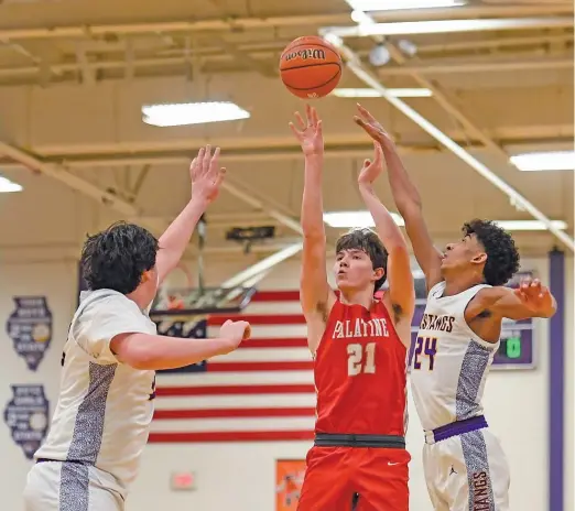  ?? KIRSTEN STICKNEY/SUN-TIMES ?? Connor May (21) scored 21 points Wednesday night as Palatine stunned Rolling Meadows to win its first conference title in 30 years.