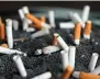  ?? AP Photo/Jenny Kane, File ?? ■ This 2019 photo shows cigarette butts in an ashtray in New York. Lung cancer is the nation’s top cancer killer, causing more than 135,000 deaths each year. Smoking is the chief cause and quitting is the best protection.