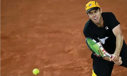  ?? Photograph: AnneChrist­ine Poujoulat/AFP/Getty Images ?? Sam Querrey returns the ball to Russia’s Andrey Rublev during their first-round match at this year’s French Open.