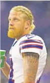  ?? RICK OSENTOSKI/AP FILE PHOTO ?? Bills wide receiver Cole Beasley has to spend at least five days away from the team facility after having close contact with a trainer who tested positive for the coronaviru­s. Beasley and others have refused to get vaccinated.