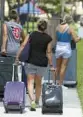  ?? CARLINE JEAN/SOUTH FLORIDA SUN SENTINEL ?? Florida Atlantic University freshmen and their families during dorm move-in day in Boca Raton on Tuesday.
