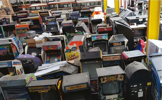  ??  ?? » The basement of Arcade Club Bury highlights just how many cabinets Andy has access to.