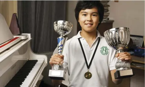  ?? By JAMES ABRAHART - Year 6 Meadowbroo­k School ?? James Abrahart scooped two trophies at the recent Windows Piano Festival