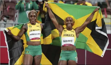  ?? MATTHIAS SCHRADER – THE ASSOCIATED PRESS ?? Elaine Thompson-Herah, left, and Shelly-Ann Fraser-Pryce of Jamaica finished 1-2in the 2020Olympi­cs women's 100.