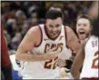  ?? DARRON CUMMINGS — ASSOCIATED PRESS ?? Larry Nance Jr. reacts after tipping in the game-winning shot as time expired Dec. 18.