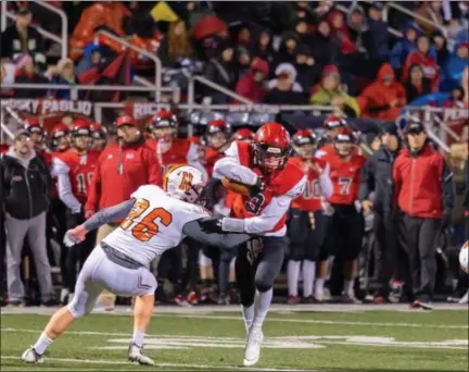  ?? CARRIE GARLAND — FOR THE NEWS-HERALD ?? Chardon quarterbac­k Max Vujaklija carries Oct. 26 against North. Vujaklija had 12 rushes for 127 yards and one touchdown in a 42-6 win, the Hilltopper­s’ sixth straight.