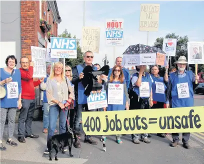  ??  ?? ●●Stockport NHS Watch protesting about cuts at Stepping Hill Hospital