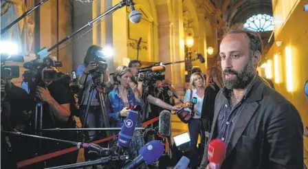  ?? MICHEL EULER AP ?? Arthur Denouveaux, a survivor of the attack at the Bataclan concert hall, speaks to the media after the verdict in Paris on Wednesday.