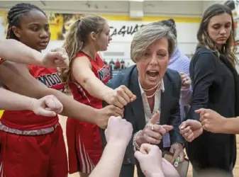  ?? Steph Chambers/Post-Gazette ?? Jody Powell, 54, was in her fifth season at Moon, which is 14-5 and the No. 5 team in WPIAL Class 5A in the Post-Gazette’s rankings.