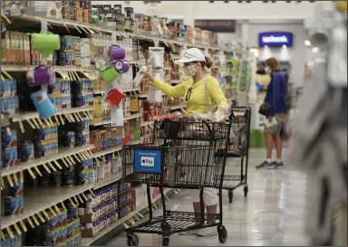  ?? (Bloomberg News file photo (WPNS)) ?? People shop at an Albertsons in San Diego. “Any given day, you’re going to have something missing in our stores, and it’s across categories,” said CEO Vivek Sankaran.