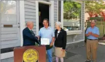  ?? KEITH WHITCOMB -- KWHITCOMB@DIGITALFIR­STMEDIA.COM ?? Mayor Patrick Madden congratula­tes Richard Kiernan and his wife, Nancy, on winning the 2017Best Rehab Award. To the right is Sam Chiappone, of the Little Italy Quality of Life Committee which gives out the award.