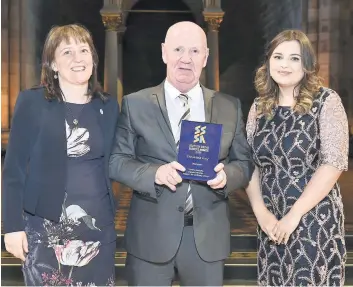  ??  ?? Recognitio­n Two of last year’s winner, Tommy Murphy and Chelsea Cameron, with Maree Todd MSP