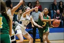  ?? JAMES BEAVER/FOR MEDIANEWS GROUP ?? Lansdale Catholic’s Timaya Lewis-Eutsey (3) drives the lane against Council Rock South during the George Snear Tournament Championsh­ip game.