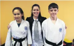  ??  ?? Well done Instructor Liz McKenna with Maythu Pettigrew and Josh Broadley Success Youngsters Andrew Waddell and Thomas Muir with Instructor Liz McKenna