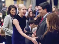  ??  ?? Ivanka Trump greets patrons as the U.S. ambassador to the United Nations, Nikki Haley, left, looks on before the start of the play on Wednesday.