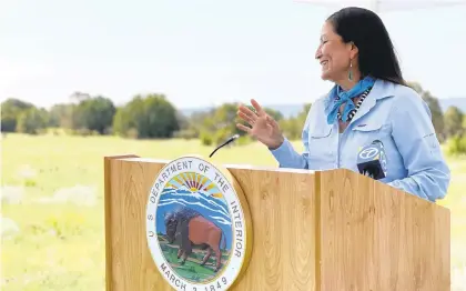  ?? FELICIA A. SALAZAR/AP ?? U.S. Interior Secretary Deb Haaland speaks at the Sabinoso Wilderness in Las Vegas, New Mexico, to accept a land donation. She is the first Native American to serve as a cabinet secretary.