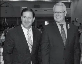  ?? FILE PHOTO BY HOWARD FISCHER/ CAPITOL MEDIA SERVICES ?? MARICOPA COUNTY ATTORNEY BILL MONTGOMERY (right) at a 2017 event with Gov. Doug Ducey.