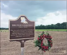  ?? AP PHOTO ?? This file photo shows the Bruslie Cemetery, a burial ground for slaves in New Orleans. The Shell Oil Company has spruced up, marked and blocked off tracts of its land in the Convent community west of New Orleans where archaeolog­ists confirmed the...