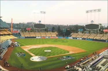  ?? Associated Press photo ?? Dodger Stadium viewed on Thursday, a day ahead of World Series Game 3 between the Los Angeles Dodgers and the Boston Red Sox. The Series shifted scene after the Red Sox took a 2-0 lead in the cold of Boston's Fenway Park.