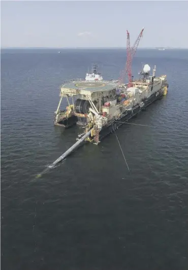  ?? ?? The Castoro 10 pipelay vessel lays concrete-coated pipe for the Nord Stream 2 gas pipeline