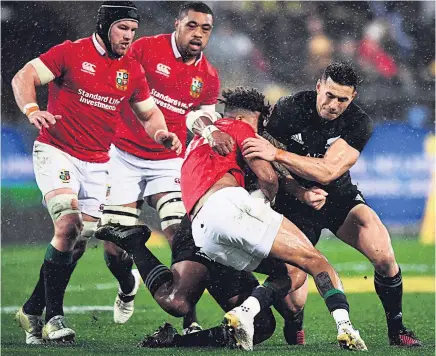  ?? Picture / Photosport ?? Sonny Bill Williams was sent off and banned after this shoulder charge on Lions wing Anthony Watson.