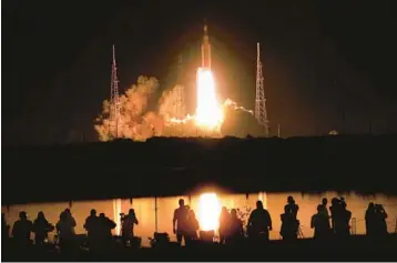  ?? JOE BURBANK/ORLANDO SENTINEL ?? NASA’s Artemis I lifts off from launch pad 39-B at Kennedy Space Center carrying the Orion spacecraft on a mission to orbit the moon early on Nov. 16. The long-delayed mission gave NASA a win last year, according to an associate administra­tor at the agency.