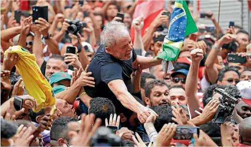  ?? AP ?? Former Brazilian President Luiz Inacio Lula da Silva is carried by supporters during a rally at the Metal Workers Union headquarte­rs, in Sao Bernardo do Campo, Brazil.