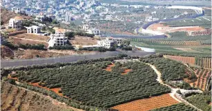  ?? (Amir Cohen/Reuters) ?? THE REINFORCEM­ENTS sent to the Lebanese border, one battalion and a number of additional troops, were deployed to the Galilee Division.