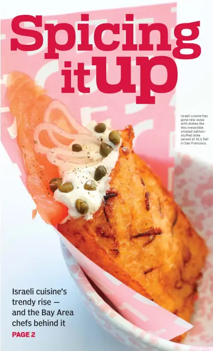  ?? ARIC CRABB — STAFF PHOTOGRAPH­ER ?? Israeli cuisine has gone new wave with dishes like this irresistib­le smoked salmonstuf­fed latke served at AL’S Deli in San Francisco.