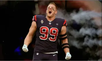  ??  ?? In this Dec. 2 file photo, Houston Texans defensive end J.J. Watt (99) screams before an NFL football game against the Cleveland Browns, in Houston.AP Photo/ErIc chrIstIAn smIth