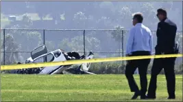  ?? BRITTANY MURRAY — STAFF PHOTOGRAPH­ER ?? A single-engine Sling aircraft crash landed at the Field of Dreams, a soccer field at 501 Westmont Drive, in San Pedro on Monday. The two people inside the aircraft were injured.