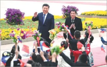  ?? XIE HUANCHI / XINHUA ?? President Xi Jinping holds a welcoming ceremony to greet Philippine President Rodrigo Duterte in Beijing on Thursday.