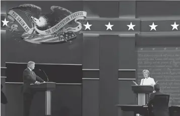  ?? ROBERT HANASHIRO, USA TODAY ?? Democratic presidenti­al candidate Hillary Clinton and Republican candidate Donald Trump meet for the third and final presidenti­al debate at the University of Nevada- Las Vegas.