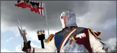  ??  ?? Captain Mortimer, of the re-enactment group Les Rouen de Routiers, at Bosworth Battlefiel­d Heritage Centre