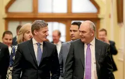  ?? PHOTO: GETTY IMAGES ?? Prime Minister Bill English and Finance Minister Steven Joyce make their way to the house for the 2017 Budget presentati­on.