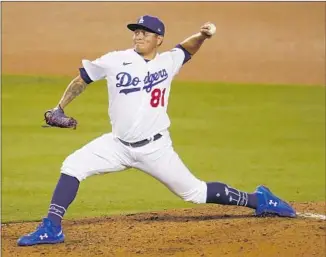  ?? Marcio Jose Sanchez Associated Press ?? AS PART OF a bullpen with the National League’s best ERA, Victor González, above, has adjusted to the majors with help from Julio Urías, who said, “I’ve tried to be there with him like a brother.”