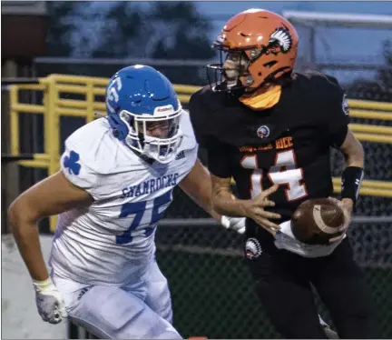  ?? PHOTOS BY TIMOTHY ARRICK — FOR MEDIANEWS GROUP, FILE ?? Detroit Catholic Central lineman Bruno Guberinich (75) recently committed to playing college football for Central Michigan University.