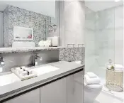  ??  ?? The two-bedroom show suite has an ensuite with a large mirror and a high-gloss vanity.